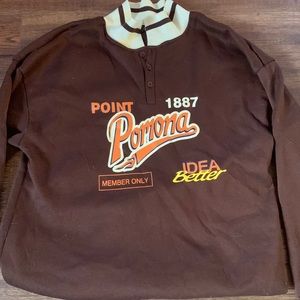 brown collared long sleve shirt